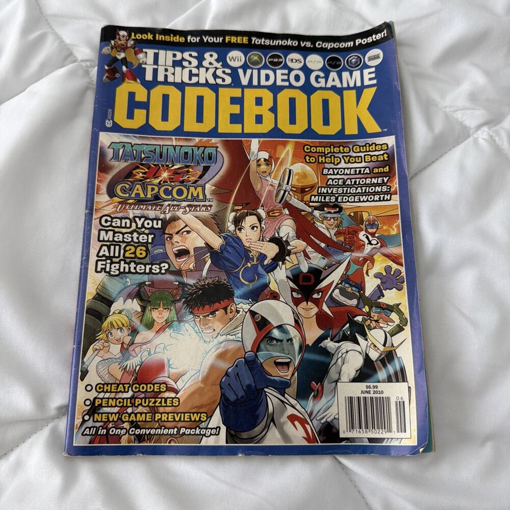 Tips And Tricks Video Game Codebook June2010 includes Super Mario/Capcom poster